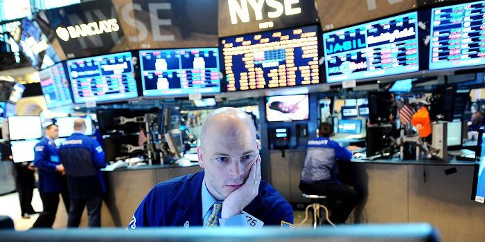 Wall Street begint lager aan drukke week