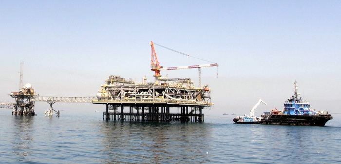 IEA: Aanhoudende verspreiding corona werpt schaduw over oliemarkt